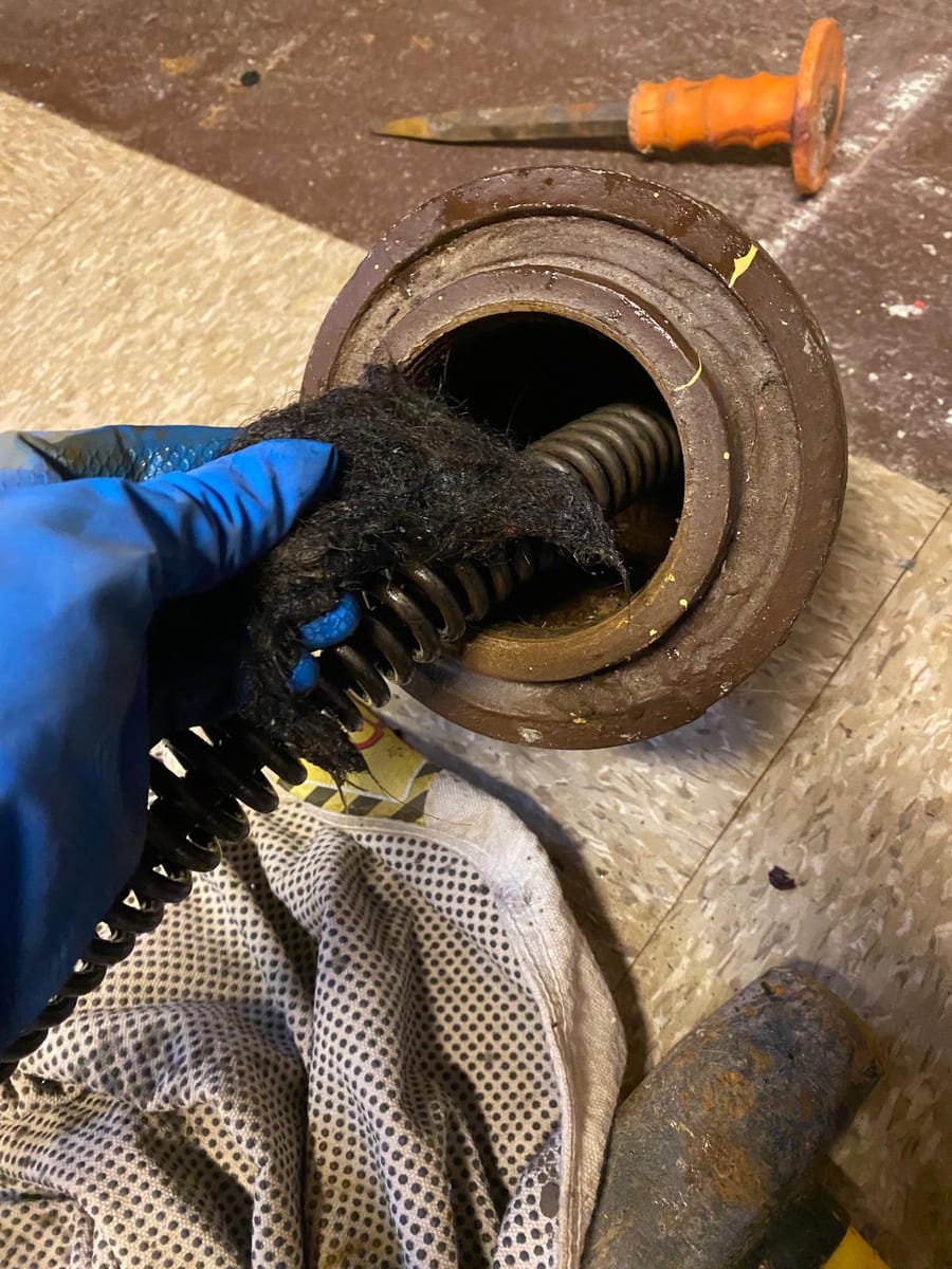 Clearing a main-line clog
